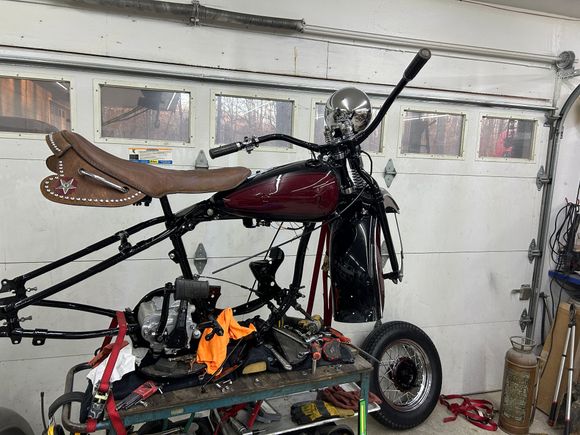 Got the seat back from the ulpolstery shop Heather's Leather in S.C.  waiingt on the bags  I furnished the Biscon leather .