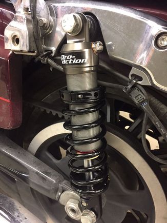Rear 11" coil over spring.
