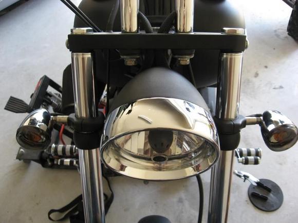 Internal wiring, powdercoated triple, blinker mounts, deuce headlight with trim ring.