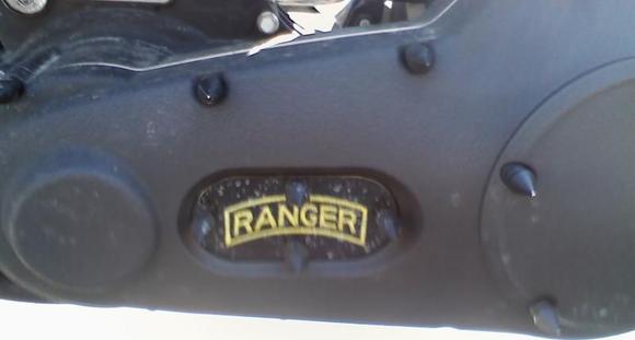 This is a free hand airbrush job of a Ranger tab, I had done on my inspection cover.