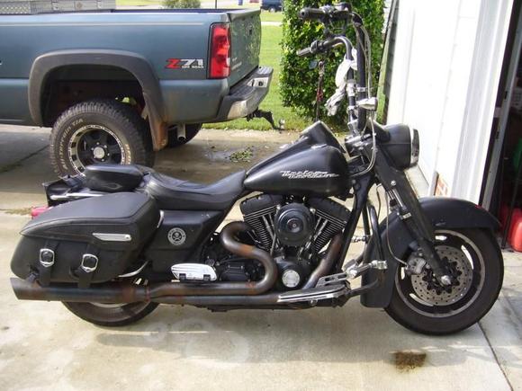 this is my 2004 road king custom. note the pipes. 11 months, and they looked like this.
