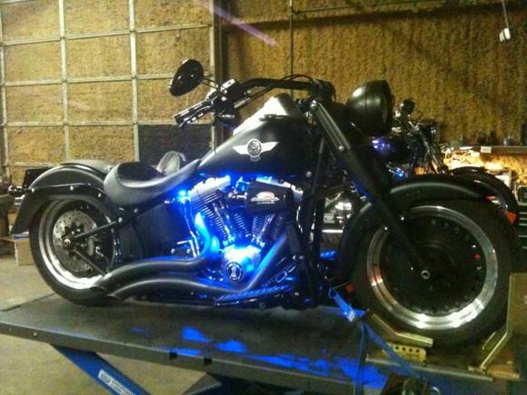 notice the flat black on front forks and headlight, completely custom.