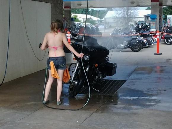 Betty getting a bath at Pig Trail Harley-Davidson during Bikes, Blues, and BBQ 2013