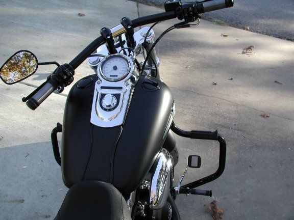 Installed black flush mount fuel gauge and cap and highway bar