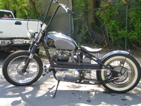 Chris' Tri... I know it's not an HD, but I think it's sweet.  And yeah, he owns a Harley too, so suck it if you can't appreciate it!!!!!!!