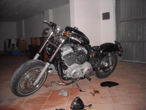 wide forks 1998 ,fat wheel, see the headlight on the floor? its a Jap one but real cheap , still gott to decide if to put that or the original,