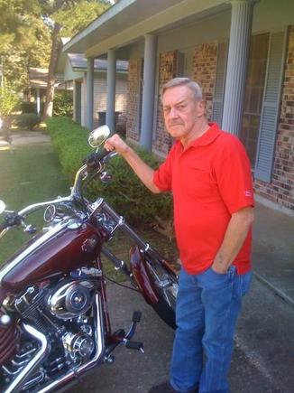 my dad standing beside rocker