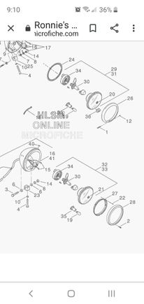 Ok looked up your headlight on ronnies microfiche. 
Your trim ring looks like the bottom one, mine looks like the top one. 
Maybe that helps with the way i was describing how to make it work. 
I had the visors on a 2011 eglide with the solid trim ring held on by the one screw.
Sorry but i can't remember the details. 
