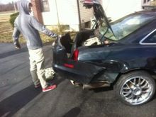 my cousin helping me out removing all the pieces that the body kit will be replacing... exciting!
