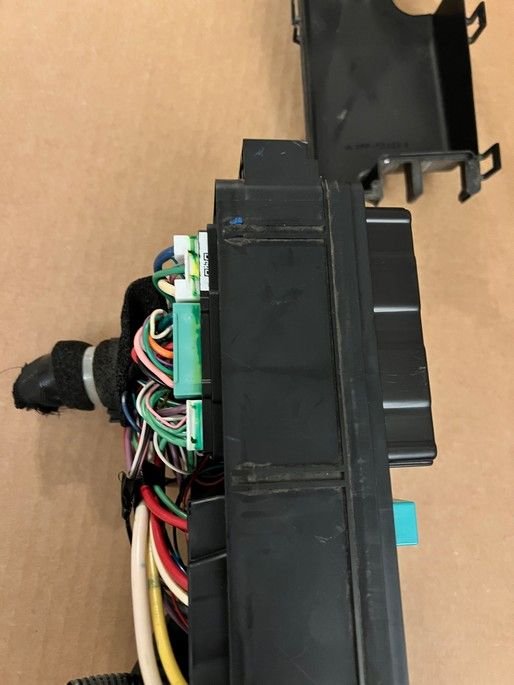 3 connectors (from top of photo to bottom - white1, green, white2) connect to bottom of 38830-T2A-A01