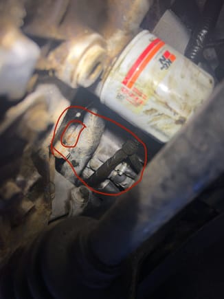 The bigger circle is what is coming off of the block the smaller circle is where it’s leaking from it looks to be coming off of the intake manifold
