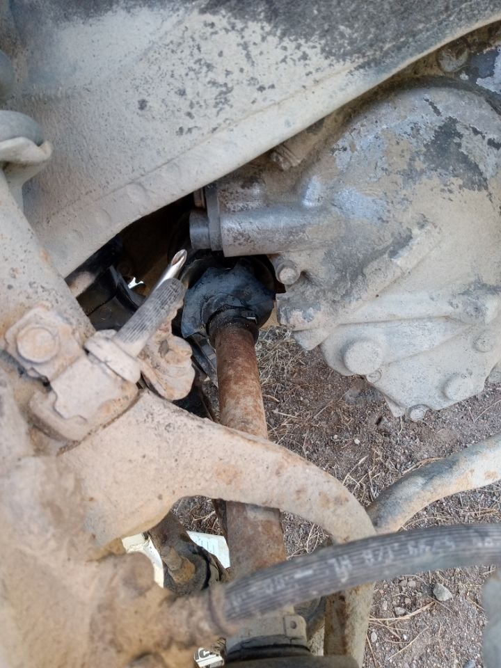 It is supposed to be connected to this sensor being pointed to with a phillips screwdriver. Its in the right side fender well, on the end of the automatic transmission.