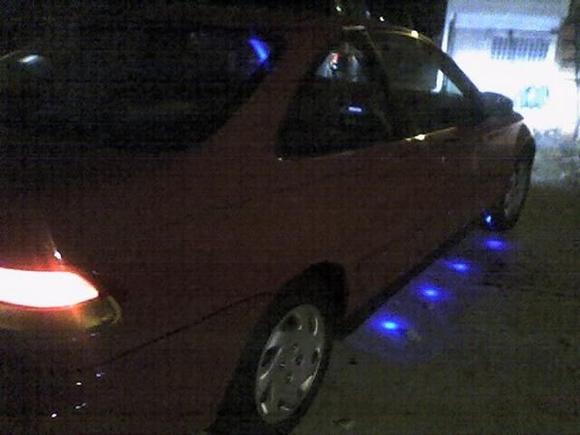 A young kid trying to make his car look better on a low budget....