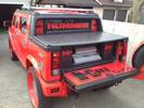 Hummer H2 Sut sittin on 30's with custom system