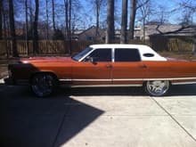 77 Lincoln Continental Town Car on 23&quot; Helo wheels w/ Nitto Tires

Inside currently torn apart and stripped down, redo-ing the whole interior. Used to have a fish tank in the back, TV's in the doors, custom fiberglasses trunk, etc.