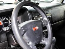 Red Vinyl on the "H" of the H3 on steering wheel