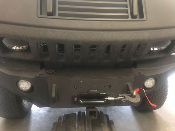 front iron bull bumper with space for a 19000 lb warn winch