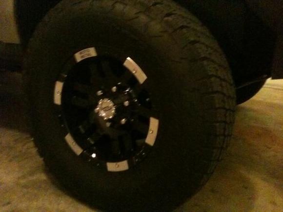 16 inch Black Moto Metal 951 (compliments of mrwheeldeal.com) wrapped in 285/75-16 Nitto Terra Grapplers