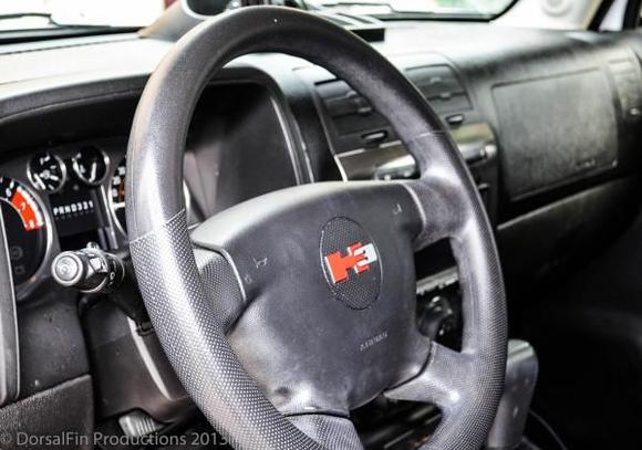 Red Vinyl on the "H" of the H3 on steering wheel