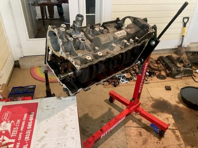 Rotating the engine in order to set it on a work bench.