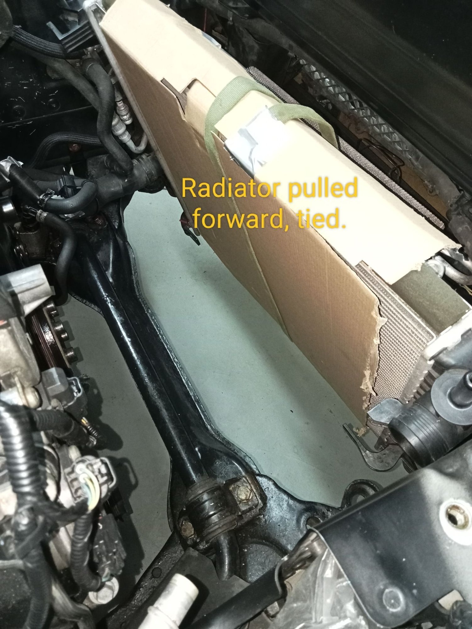 You can just about get a head, shoulder and arm up between the radiator and subframe!!