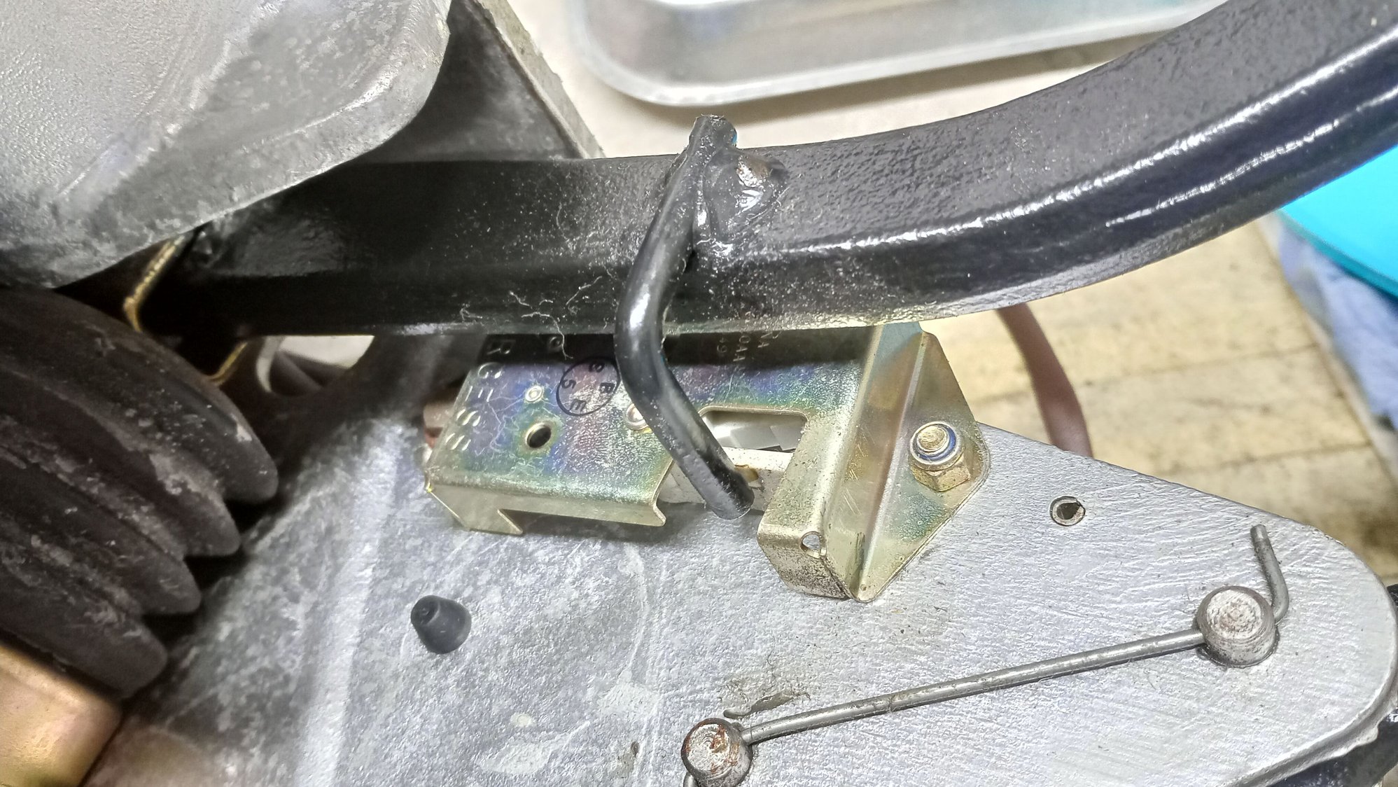 Brake switch location in pedal box