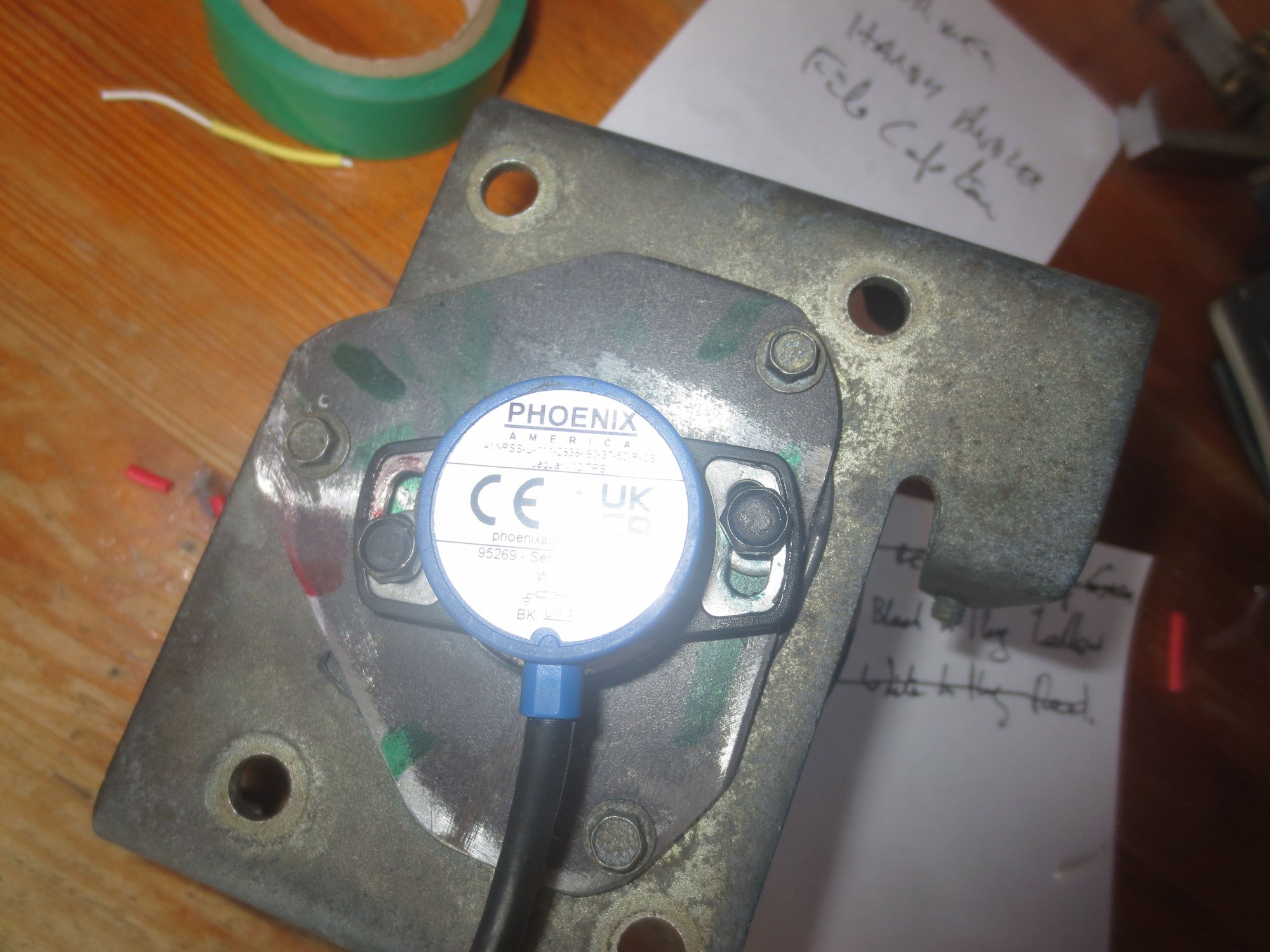 TPS here with fixing holes tapped, tiny bolts fitted and then voltage adjusted.