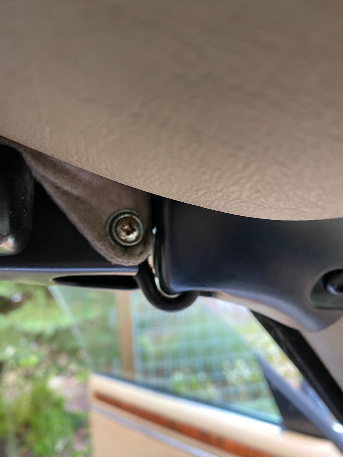 You can see light on both sides between header gasket and convertible top above door.  