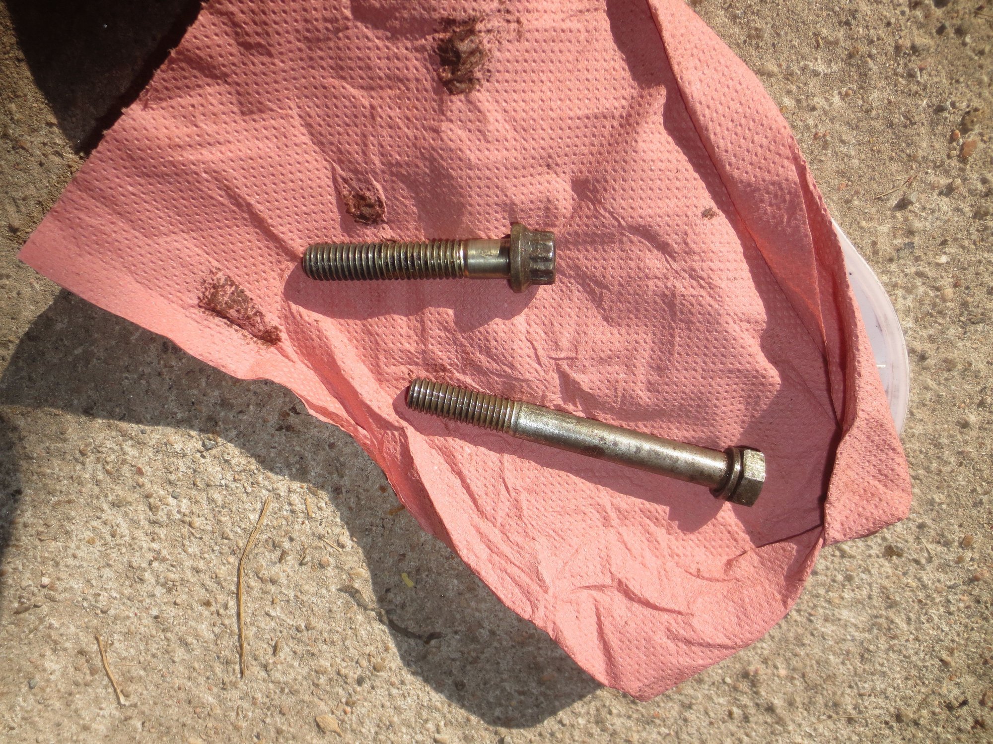 Top starter bolt at the top; bottom starter bolt at the bottom of the photo