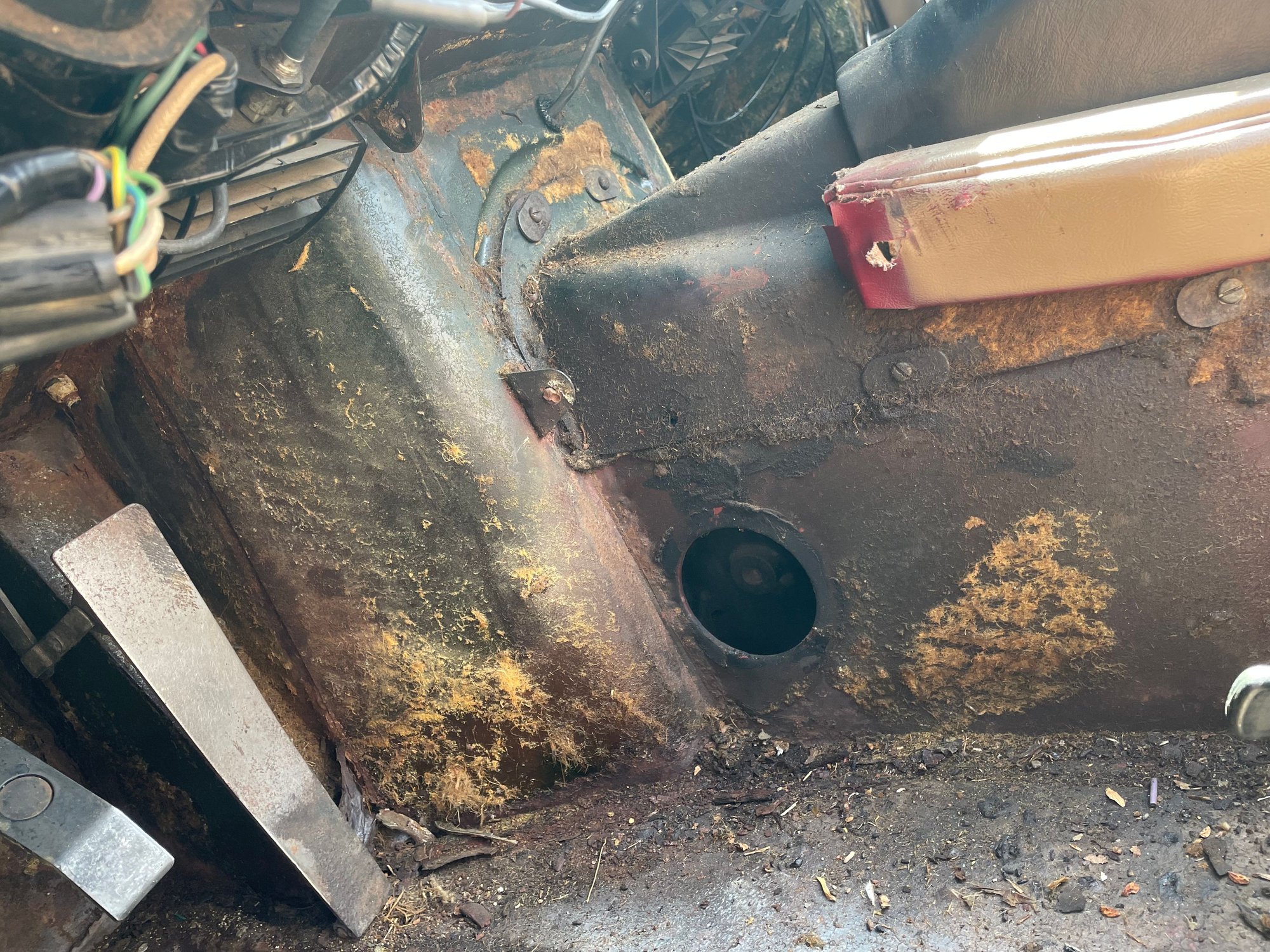 transmission tunnel opening, driver side