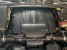 Big V* under that cover.  Highway mileage, though, is reasonable at 27-28 MPG.