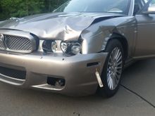 After hitting a small deer at sub-highway speed, after applying my brakes and swerving. Does this look like $18,000 of damage? Note the fully intact bumper.