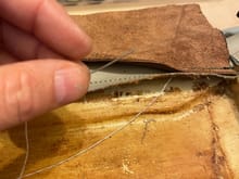 Stitching  in a leather off cut. 