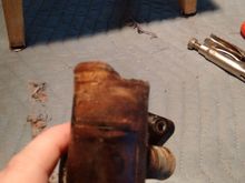 Upper radiator hose end. Again, light finger pushing