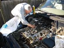 Senior engineer Jack cleaning the gasket surfaces.