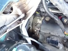 RHD vehicle. Booster, wiper assembly and annoying loom clip hole on rear of cam cover..