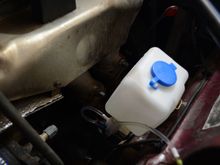 fitting a new washer bottle - wouldn't fit in usual place.