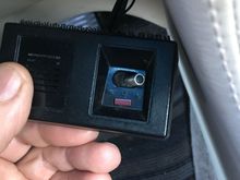 Hanging out of dash driver side