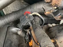 This is in the back left part of the manifold.