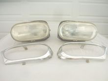 Headlight set with outer trim