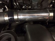 Plenty of room, not a single spot where the pipes, clamps, or silicone are touching.