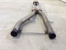 Stock center rear connection is a simple slip fit