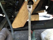 Here the home made crank pulley lockerI put it in used, The car was on jack stands, I have to lay on the floor and used my leg to push the breaker bar handle, I got the job done.