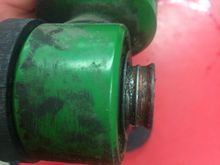 This is the rear shock after cleaning out the old dust boot and spring retainers. The new pieces I made will seal against the inside bush groove and will flex with the shock pivot.