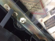 Above TV antenna points on rear window