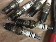 All of spark plugs were vailed white. this is the symptom of too high heat spec for cylinders. I checked the heat spec of them. These heat spec are BOSCH 7, but Genuine parts is NGK 7. Bosch 7 and NGK 7 are not same heat spec. BOSCH 7 is more heat than NGK 7. BOSCH 5 is same heat spec NGK 7. It may the cause of white vail of spark plugs and Oxygen sensor.