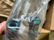 Here is the type of clip I am referencing. Not all of the hoses have them. 