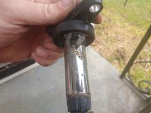 Cylinder #1 ignition coil. Newly installed, but melting itself after a short test drive. Removed excessive dielectic grease from spark plug & replaced with functioning older coil.