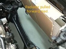 You can just about get a head, shoulder and arm up between the radiator and subframe!!