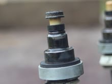 One of the 'New Injector Seals' with the 'Old One' just resting on top to make a Comparison.